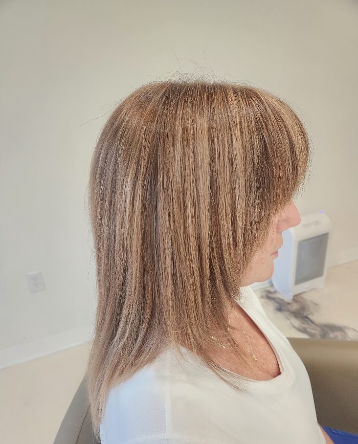Warm brunette color with face-framing layers